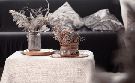 Still life details of nordic living room with a black sofa and decor in the living room.