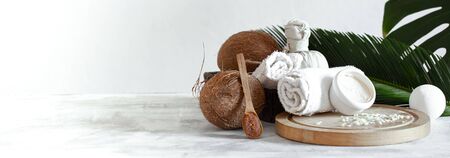 Spa composition with body care items on a light background . A place for text, a concept of beauty and body care .の写真素材