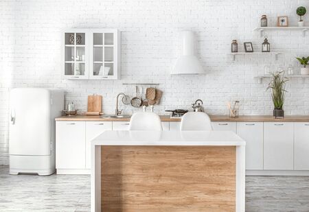 Modern stylish Scandinavian kitchen interior with kitchen accessories. Bright white kitchen with household items .の写真素材