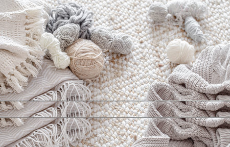 Different yarn for knitting in pastel colors. The concept of Hobbies and crafts .
