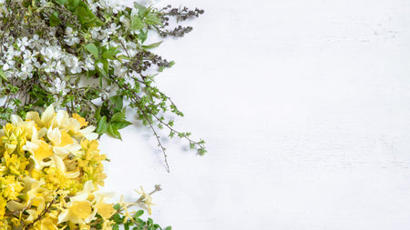 wooden light background with beautiful spring blooms.