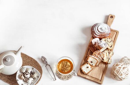 Breakfast or brunch with delicious pastries and Easter cookies. Easter meal at the festive table.の写真素材