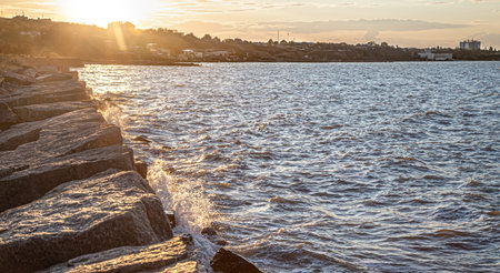 Beautiful sea at sunset near the rocky shore . Nature composition