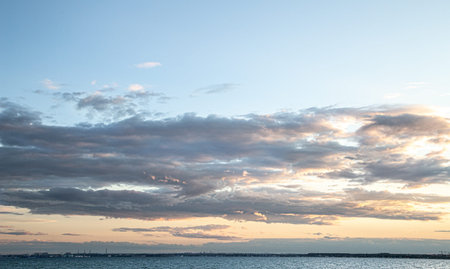 Beautiful sea at sunset near the rocky shore. Nature composition