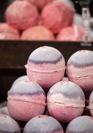 Handmade cosmetics, salt bright scented bath bombs. The concept of body care.の写真素材