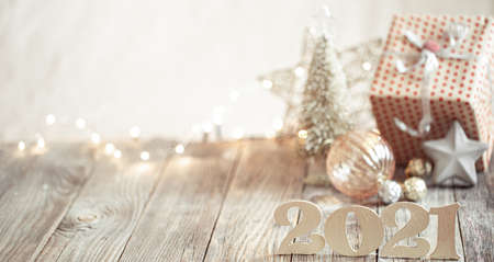 New year 2021 holiday background with decor. Blurry lights in the background. The concept of the celebration.の写真素材