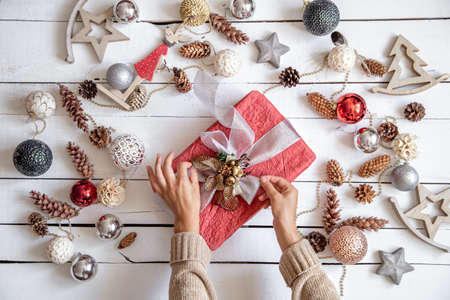 Festive new year's composition with Christmas balls and a gift box. New year's holiday concept.の写真素材