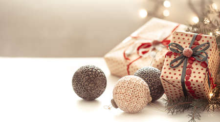 Festive background with christmas balls and gift box copy space.の写真素材