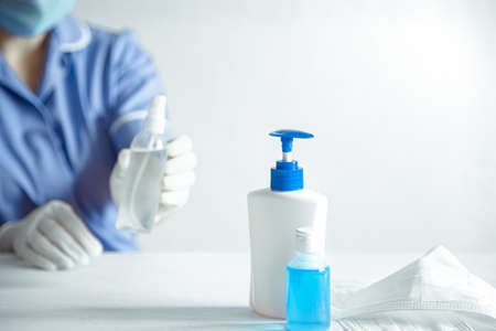 Antivirus set of items: various filtering safety face masks, sanitizer for hands. Stop virus concept.の写真素材