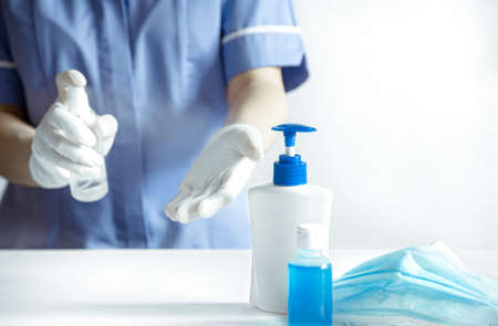 Antivirus set of items: various filtering safety face masks, sanitizer for hands. Stop virus concept.の写真素材