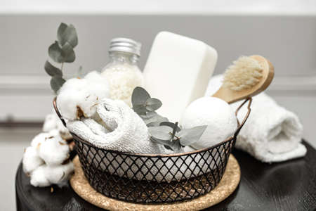 Body care products in a metal basket. Health and hygiene concept.の写真素材