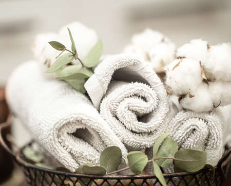 Cozy composition with clean bath towels. Hygiene and body care concept.の写真素材