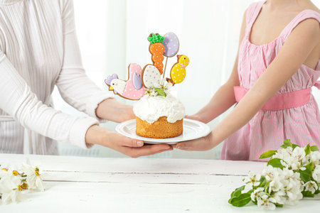 Easter composition with a beautifully decorated Easter cake. The concept of preparing for the family...