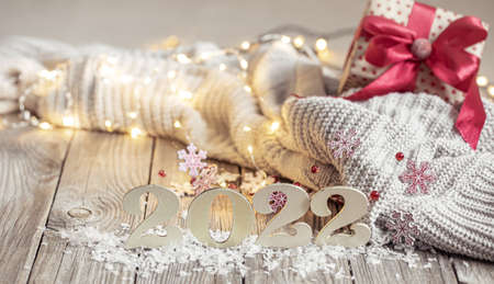 Christmas still life with decorative number of the coming year with decor details on blurred background.の写真素材