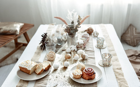 Stylish table setting for the celebration of Easter. Easter fresh baked goods.