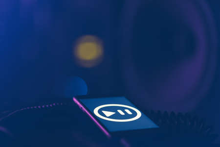 Music background with phone and with music icon and column, modern technology concept, listening to music.の写真素材