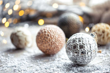 Festive background with Christmas balls and blurred bokeh lights.の写真素材