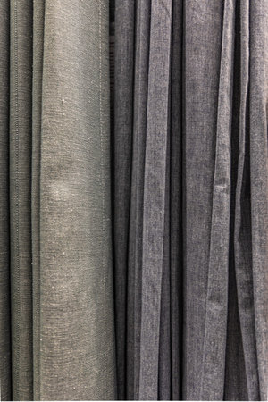 Set of grey dense fabrics of uniform texture.
