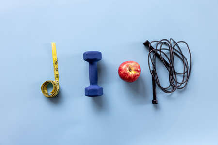 Sports equipment items on blue, flat lay.の写真素材