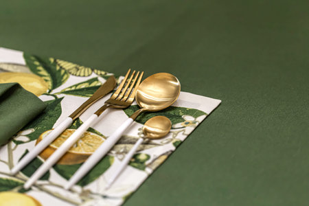 Close-up of a set of cutlery on a served table.