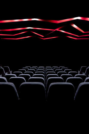 Concert hall, cinema hall with switched off lights and soft seats.の写真素材