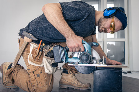 Circular Saw, carpenter using a circular saw for wood.の写真素材
