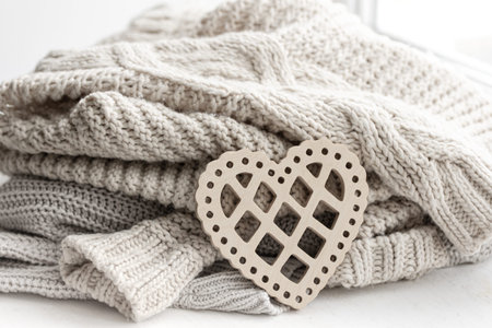 Cozy background for Valentines Day with a decorative heart.