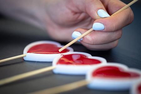 Close-up, the process of making lollipops from natural ingredients.