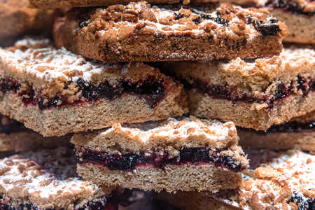 Close-up, pieces of grated pie on a shop window.の写真素材