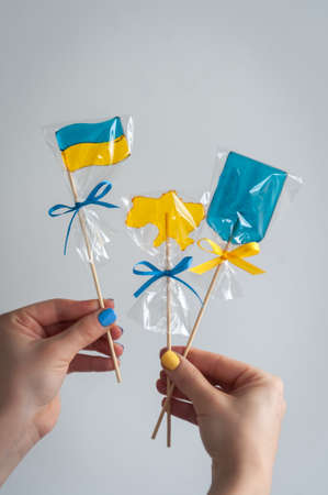Patriotic lollipops in the form of Ukrainian symbols.の写真素材