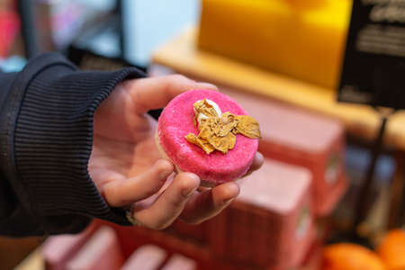 Beautiful natural handmade soap in a female hand.の写真素材