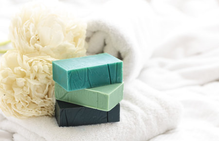 Spa composition with colorful handmade soap close-up.
