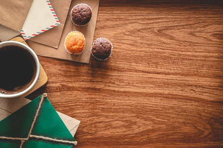 Vintage composition with envelopes on wooden background, flat lay.