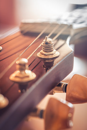 Strings on a classical acoustic guitar, macro shot.の写真素材