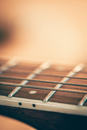 Strings on a classical acoustic guitar, macro shot.の写真素材