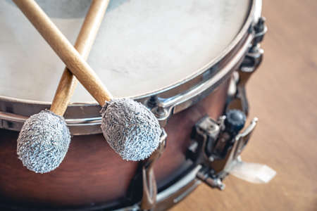 Close-up, drumsticks on a blurred background.の写真素材