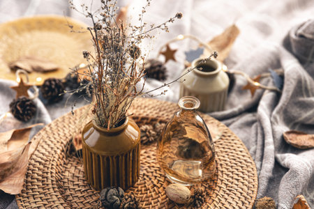 Cozy autumn composition with decorative details, candles.の写真素材