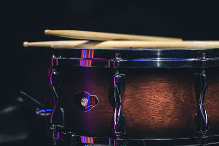 Close-up, snare drum on a dark background isolated, copy space.の写真素材
