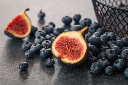 Close-up, figs in the cut among the berries.の写真素材