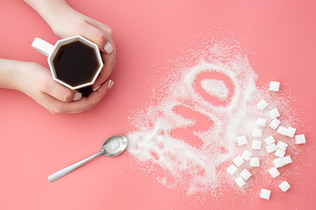 Word No made of sugar and cup of coffee on pink background, flat lay.の写真素材