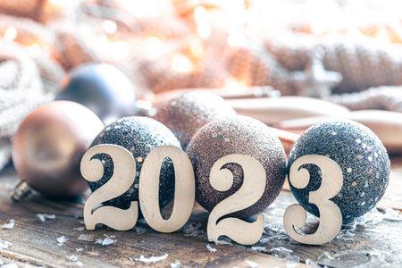 Christmas background with numbers 2023 and balls for the Christmas tree.の写真素材