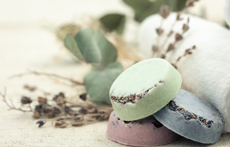 Spa composition with colorful handmade soap on a blurred background, copy space.の写真素材