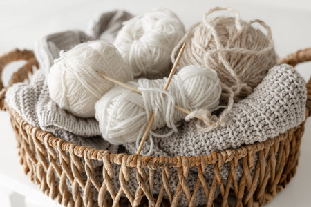 Basket with yarn close-up, threads for knitting.
