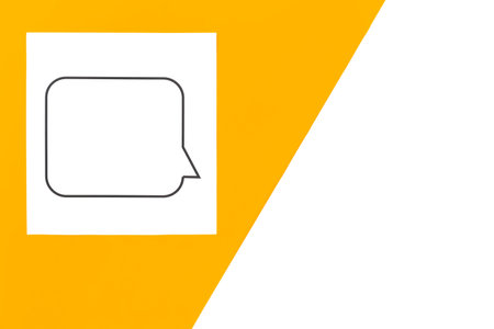 Speech bubble on white paper on orange background, flat lay.の写真素材