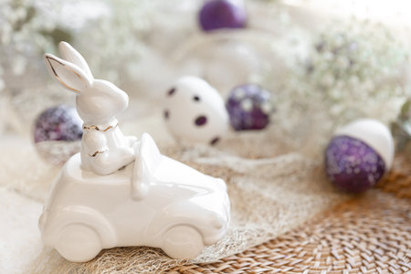 Festive Easter background with decorative ceramic hare.の写真素材