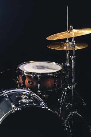 Snare drum on a blurred dark background, part of a drum kit.の写真素材