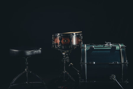 Drum kit on a black background close-up.の写真素材