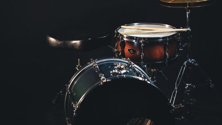 Drums on a dark background, part of a drum kit.の写真素材