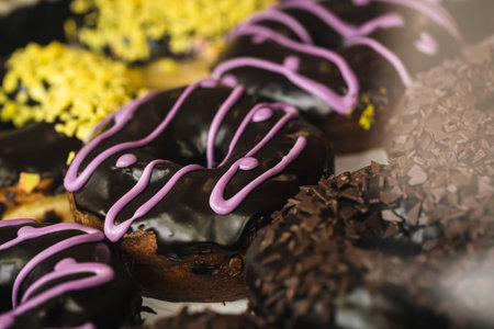 Appetizing donuts on the showcase of a cafe, close-up.の写真素材