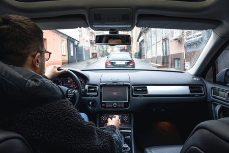 Hands on the wheel when driving at high speed from inside the car.